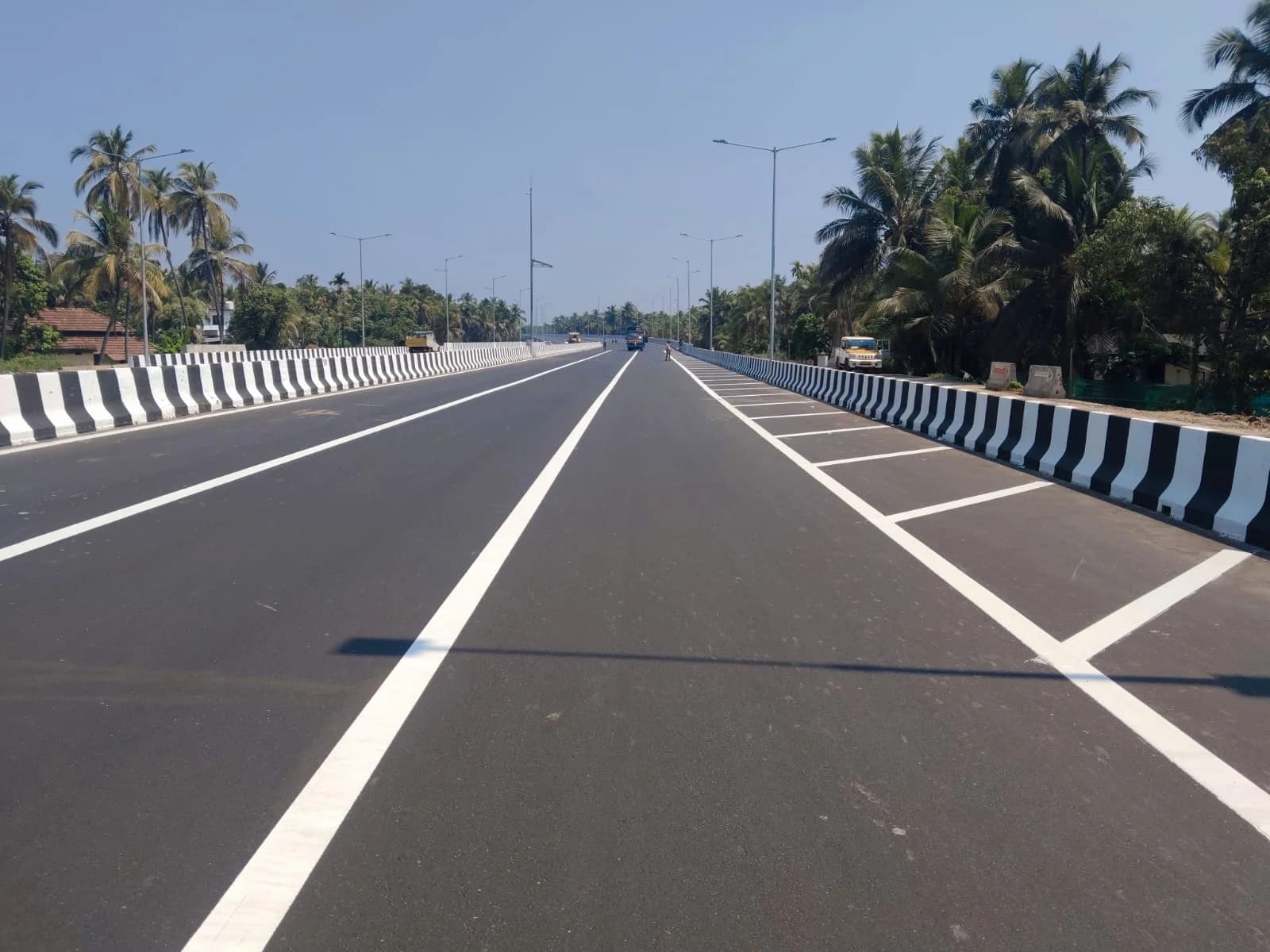 Road Marking Solutions - Durable thermoplastic and cold paint marking systems for lane demarcation, arrow symbols, and pedestrian crossings.