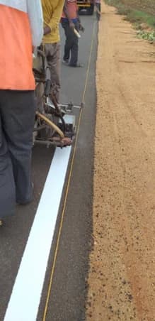 Arrow & Symbol Markings - Directional arrows, turn markings, stop lines, and regulatory symbols compliant with IRC standards for traffic guidance.